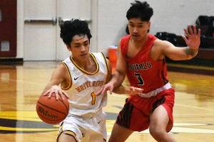 The White River High gym was home to a Friday night doubleheader between the Hornets and the visiting Franklin Pierce Cardinals. White River won both ends, the boys in a squeaker and the girls in a blowout.