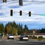 Drivers negotiate the Krain intersection without power Monday morning after a major windstorm knocked out power across much of the Plateau Jan. 9. In Enumclaw, tossed-around trash and recycling bins and downed branches signaled the effects of the angry winds. Photo by Alex Bruell.