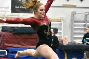 PHOTOS BY KEVIN HANSON
Competing for Enumclaw Friday night were Mylee Bonthuis on bars, Aislinn Binder on beam and Ashley Dickerson in the floor exercise.