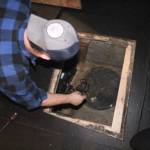 Without this pump, located under the Enumclaw High School auditorium stage, the carpet under the front rows of seats become completely soaked. Photo by Ray Miller-Still