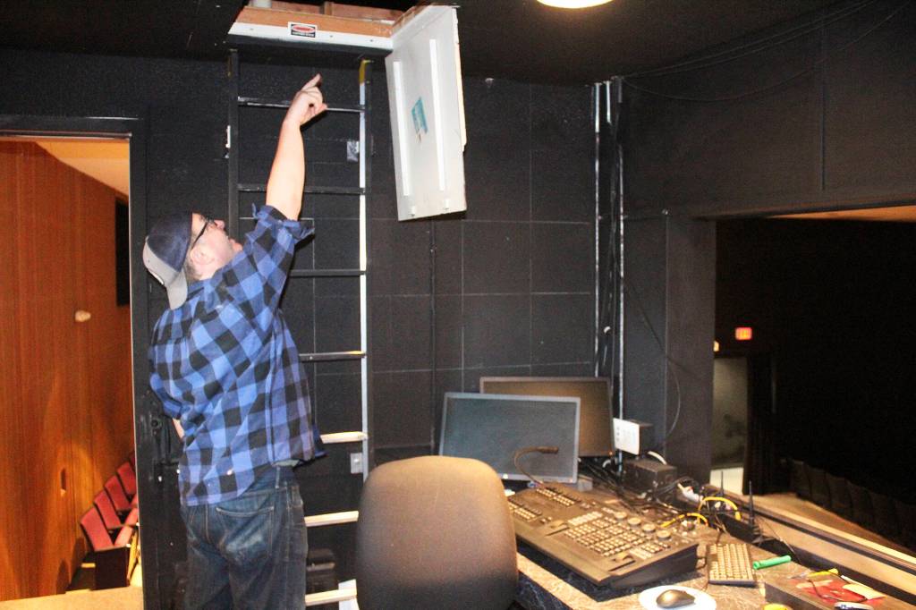 Many lights above the EHS auditorium are dead and the only way to change them is to head up this ladder…