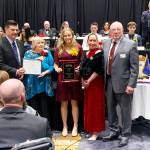 Photos by Ray Miller-Still
Enumclaws Veterans of Foreign War Post 1949 recently celebrated local students and first responders during its Jan. 26 meeting. The annual event honors students in middle and high school that participate in the Patriot Pen and Voice of Democracy essay contests, respectively. This year, VoD essay winner Natalie DeMarco (top middle) also placed first in the state VFWs essay competition, which means she will be traveling to D.C. to compete nationally in March for the opportunity to win up to $30,000 in college scholarship money. Go online at cmg-northwest2.go-vip.net/courierherald to read her essay entry. Also honored by the VFW were Enumclaw officer Trevor Pourchot (pictured with his daughter), dispatcher July Kenezuroff, and firefighter Ryan Rodenberg. Finally, VFW member Elbert Reed (pictured) was honored as Veteran of the Year.