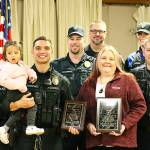 Officer Pourchot and dispatcher July Kenezuroff (maroon). Photo by Ray Miller-Still