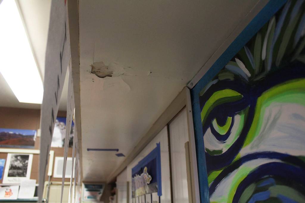 Water damage, like whats shown here, is common throughout Byron Kibler Elementary. The teacher who uses this particular room said this leak ruined all the books on the shelf it was over. Photo by Ray Miller-Still
