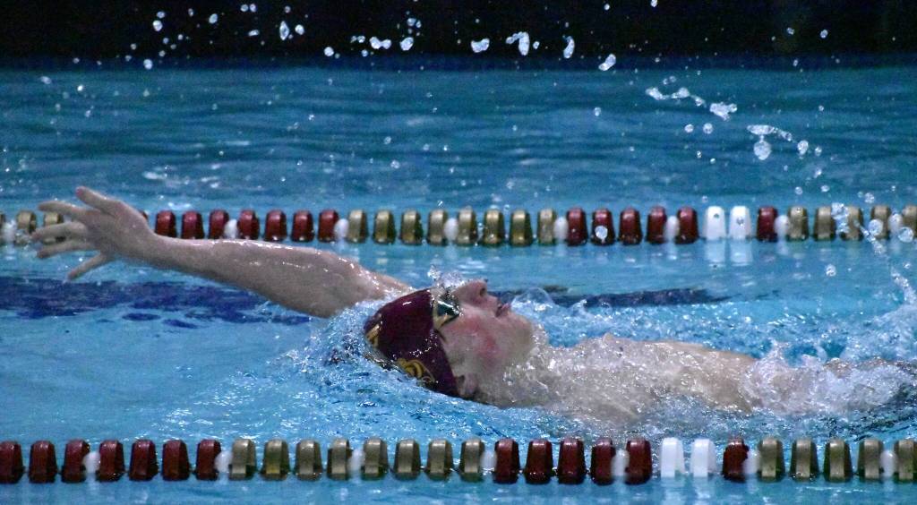 Swimmers from Enumclaw and White River high schools wrapped up the regular season Jan. 31 with a successful home meet against a combined Franklin Pierce/Washington squad. In this photo, White Rivers Mason Arnold is on his way to victory in the backstroke. Photo by Kevin Hanson