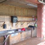 The volunteers that run the concessions at Petes Pool have to bring in all their own equipment, though there is running water for them to use. Photo by Ray Miller-Still