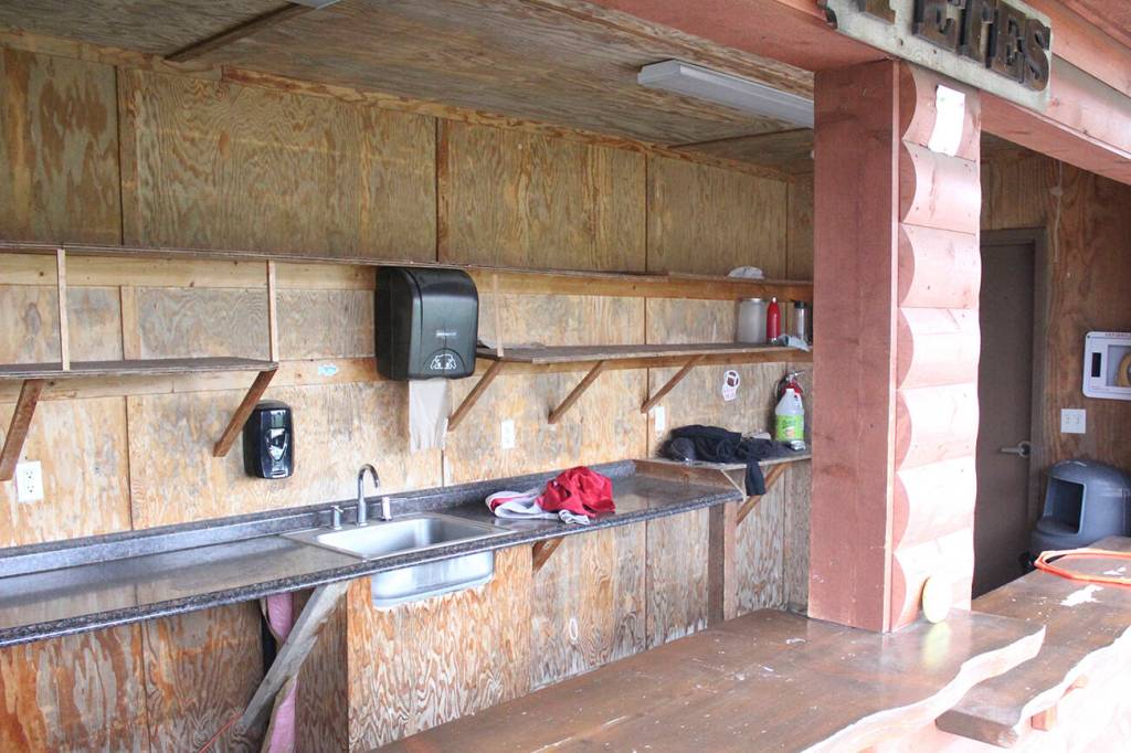 The volunteers that run the concessions at Petes Pool have to bring in all their own equipment, though there is running water for them to use. Photo by Ray Miller-Still