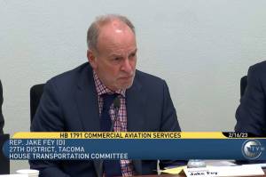 Tacoma Rep. Jake Fey (D) speaks to the future of Washington states commercial aviation needs during a Feb. 16 House of Representatives transportation committee hearing. Photo via TVW.