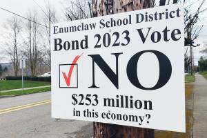 A sign encouraging local voters to reject the Enumclaw School Districts recent bond measure. Photo by Ray Miller-Still