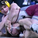 White River senior Chase Campbell battles Waylen Land of W.F. West High during an opening-round state tourney match at 182 pounds. Campbell fell in his opener but bounced back with two victories on Friday. Photo by Kevin Hanson