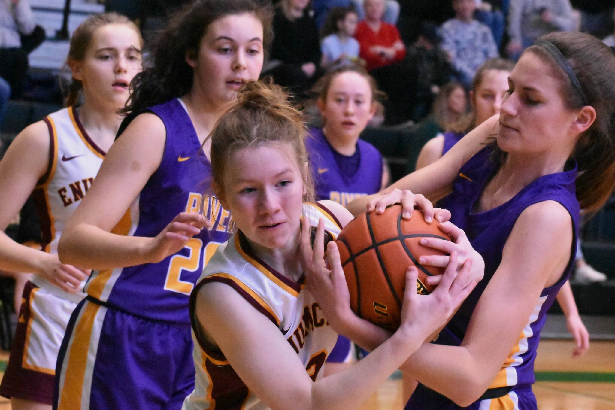 Enumclaw's Kalee Swanson wrestles for a loose ball during Saturday's victory over the Columbia River Rapids. Photo by Kevin Hanson
