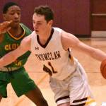 PHOTOS BY KEVIN HANSON The Enumclaw boys basketball team earned top honors when postseason accolades were announced by the South Puget Sound League 2A. Terry Johnson was named Coach of the Year and Hornet senior Carter DeRosier was selected as Most Valuable Player.