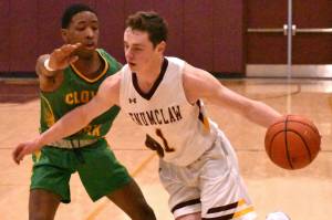 PHOTOS BY KEVIN HANSON The Enumclaw boys basketball team earned top honors when postseason accolades were announced by the South Puget Sound League 2A. Terry Johnson was named Coach of the Year and Hornet senior Carter DeRosier was selected as Most Valuable Player.