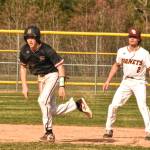 PHOTO BY KEVIN HANSON
The baseball version of the Battle of the Bridge played out over the span of two days last week (March 28 and 29) and saw the Enumclaw Hornets take victories in both SPSL 2A games. Here, Enumclaw junior Karson Holt gets a good lead off second base while White River shortstop Ty Jacobs guards the bag. The action came midway through the Wednesday contest that resulted in a five-inning, 11-1 victory for EHS.