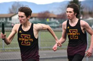 Photos by Kevin Hanson/For the Courier-Herald
After taking a brief hiatus for spring break, the Enumclaw High track and field crew returns to action with a road meet against the Orting Cardinals. Action gets under way at 3:30 p.m. Thursday at Cardinal Stadium. Among the regulars who represent EHS are Saiya Flaherty in the hurdles and Michael Poleski (left) and Jack Heise, both members of the boys relay squad. These photos came during the Hornets last home meet.