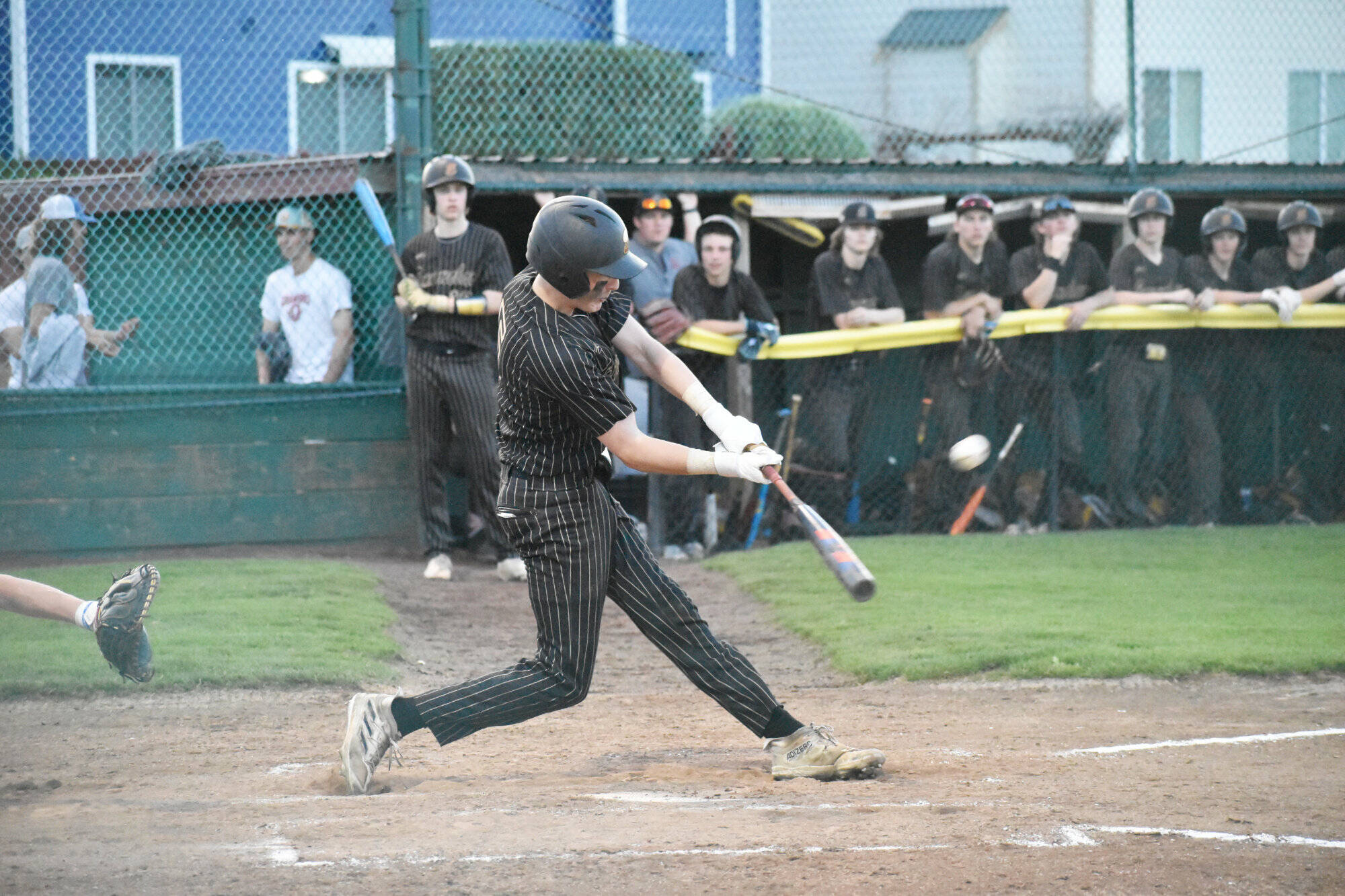 Photo by Kevin Hanson
The regular South Puget Sound League 2A season has wrapped up for most spring sports and postseason play awaits. Pictured here during a recent Enumclaw High School home baseball game is Casey Megargle putting a ball into play.