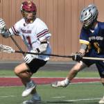 The Enumclaw Hornets will play for a state 2A championship Saturday at the Starfire Sports Complex in Tukwila. The highly-successful Hornets opened the playoffs with a May 13 victory over Squalicum and advanced to the finals with a May 20 thrashing of Burlington-Edison. Shown here, during Saturdays victory, is Jack Popke (#11). The Hornets had little trouble with Burlington-Edison, winning 22-5, and will face Orting at 10:30 a.m. Saturday for the 2A title. Photo by Kevin Hanson