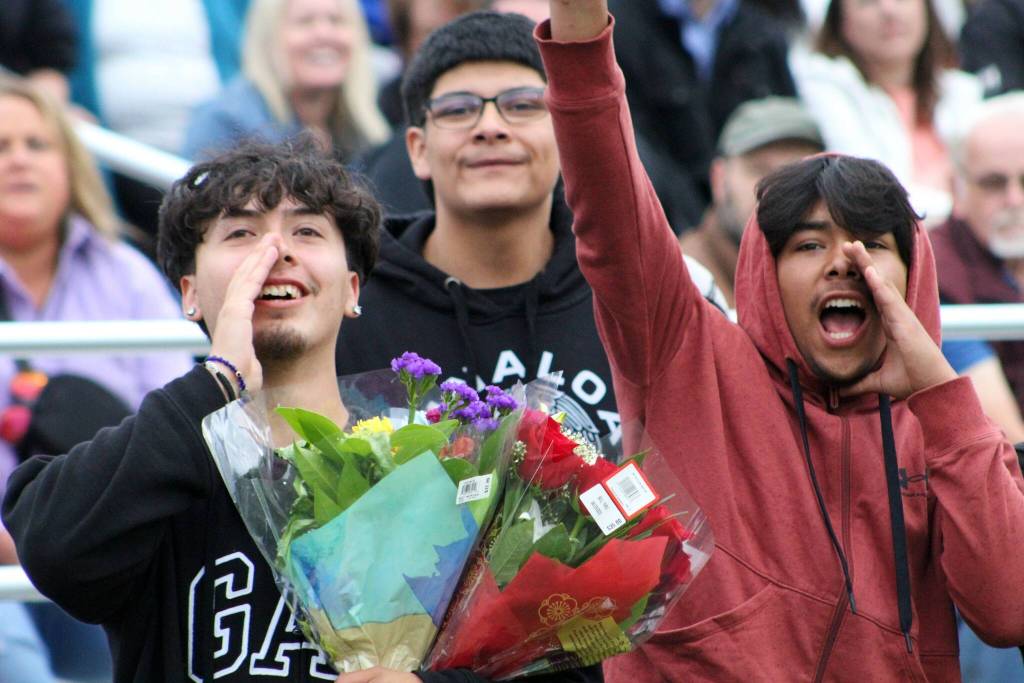 Friends cheer on graduates. Alex Bruell / Sound Publishing.