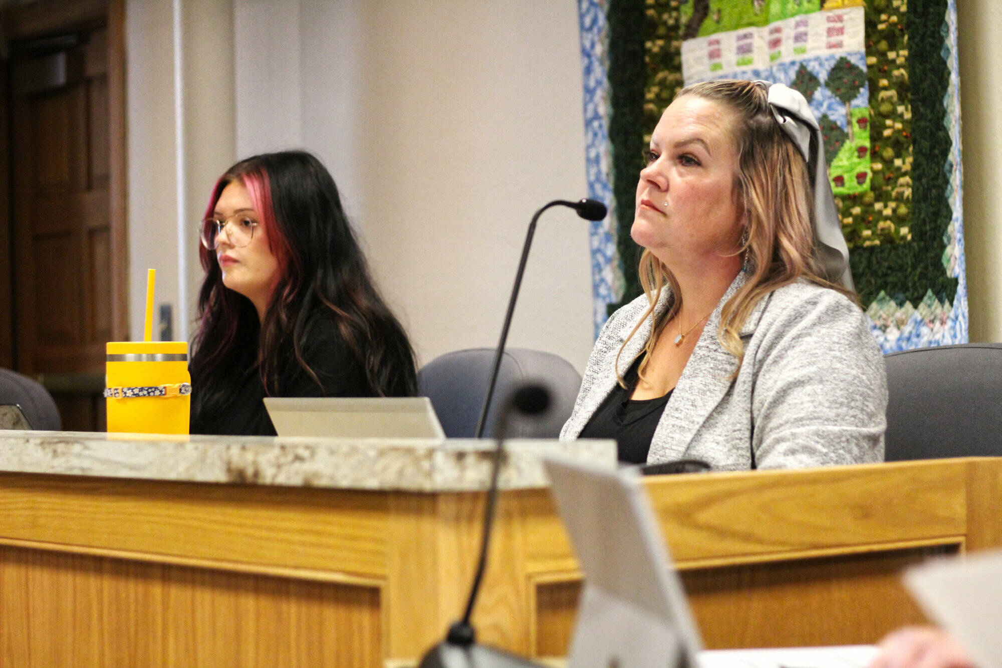 Photo by Ray Miller-Still
Somer (pronounced Summer) Johnson, right, gives updates about Enumclaw Community Program participants during the June 13 session; next to her is participant Jadyn Bond, who is also learning how to be a peer counselor for the program once she graduates on July 11.