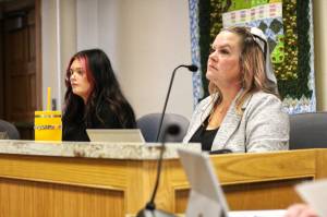 Photo by Ray Miller-Still
Somer (pronounced Summer) Johnson, right, gives updates about Enumclaw Community Program participants during the June 13 session; next to her is participant Jadyn Bond, who is also learning how to be a peer counselor for the program once she graduates on July 11.