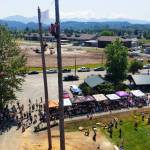 Its a race to the top! On the second pole, in the red, is BIlly Clinkingbeard, who won the event with a time of 37.19 seconds. Photo by Ray Miller-Still