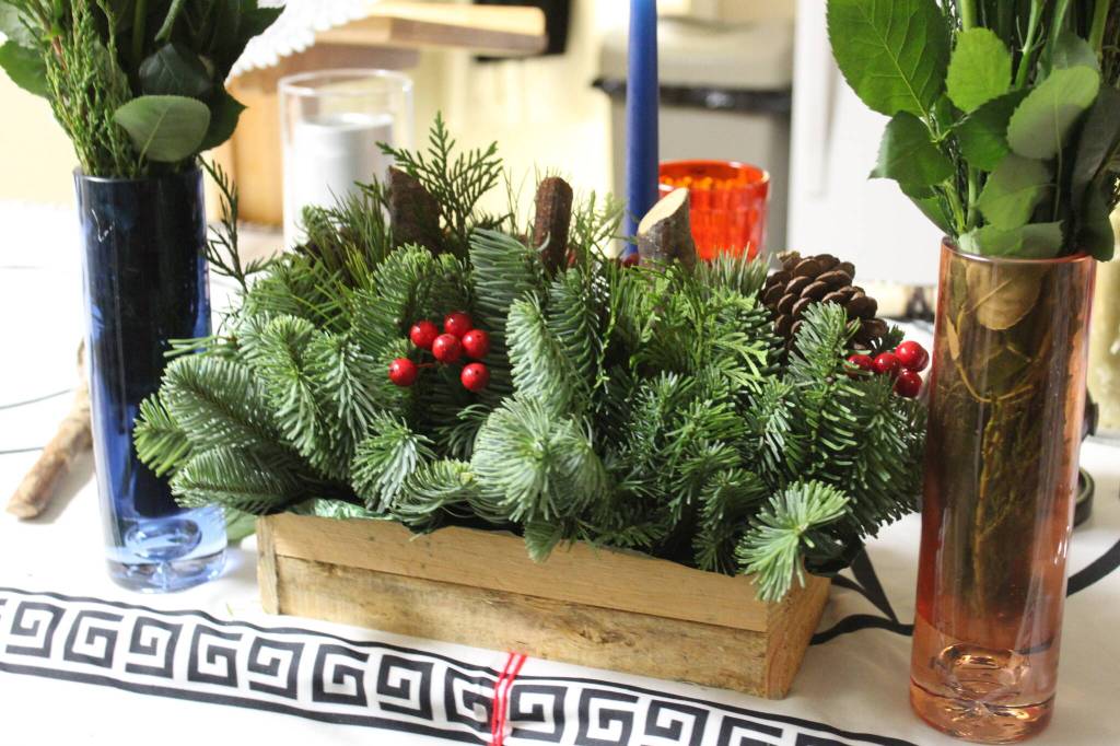 Evergreen branches, holly and cranberries have been symbols of the Winter Solstice across cultures for centuries. Photo by Bailey Jo Josie.