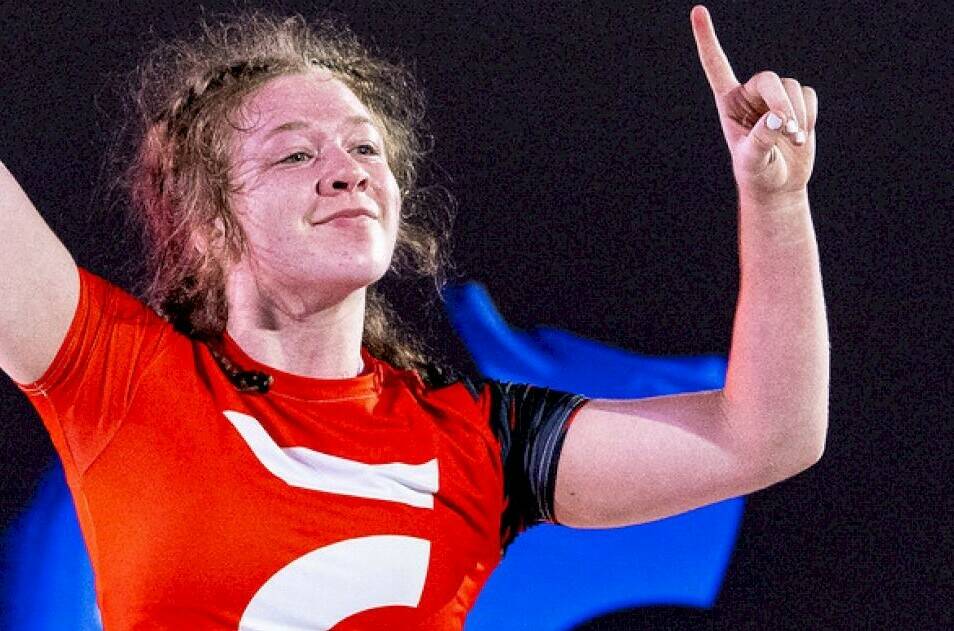 Shelby Moore, in red, and Payton Stroud, below, continue to dominate the wrestling mat at McKendree University. Contributed photos