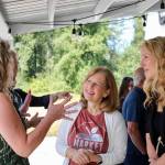 Photo By Joshua Solorzano 
Kim Schrier and Stacy Crnich socializing at The Market in Buckley.