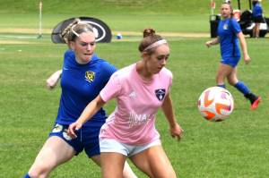 PHOTO COURTESY MIKE AVERY 
Anne Anderson looks to control a loose ball during a National Cup game.