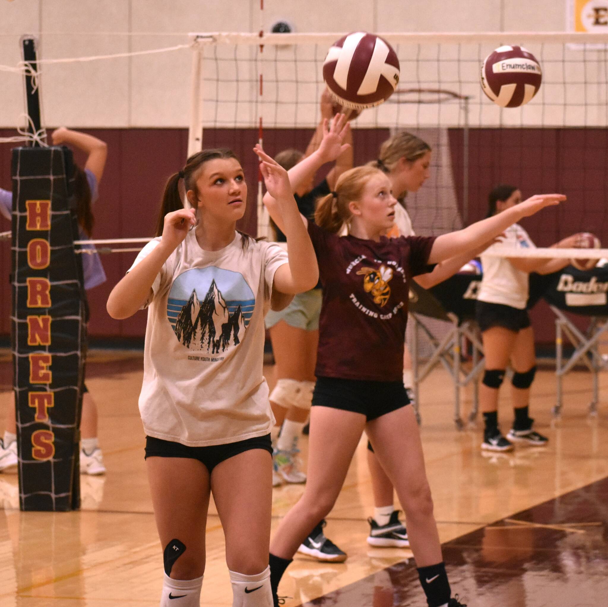 PHOTOS BY KEVIN HANSON The fall sports season is finally upon us, meaning prep athletes are fine-tuning their skills and preparing for competition. These photos are from an Enumclaw High volleyball practice late last week, where veteran head coach Jackie Carel (in pink) and her staff directed this years squad through a series of drills. The Hornets will kick off their season Tuesday, Sept. 5, with a road trip to Orting.