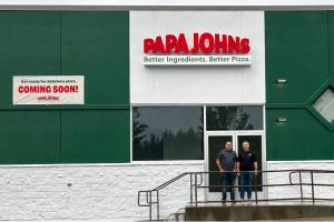Franchise Owners Jesse Smith, left, and Matt Edwards, right, at the new Papa Johns, coming soon to Bonney Lake. Photo courtesy Papa Johns