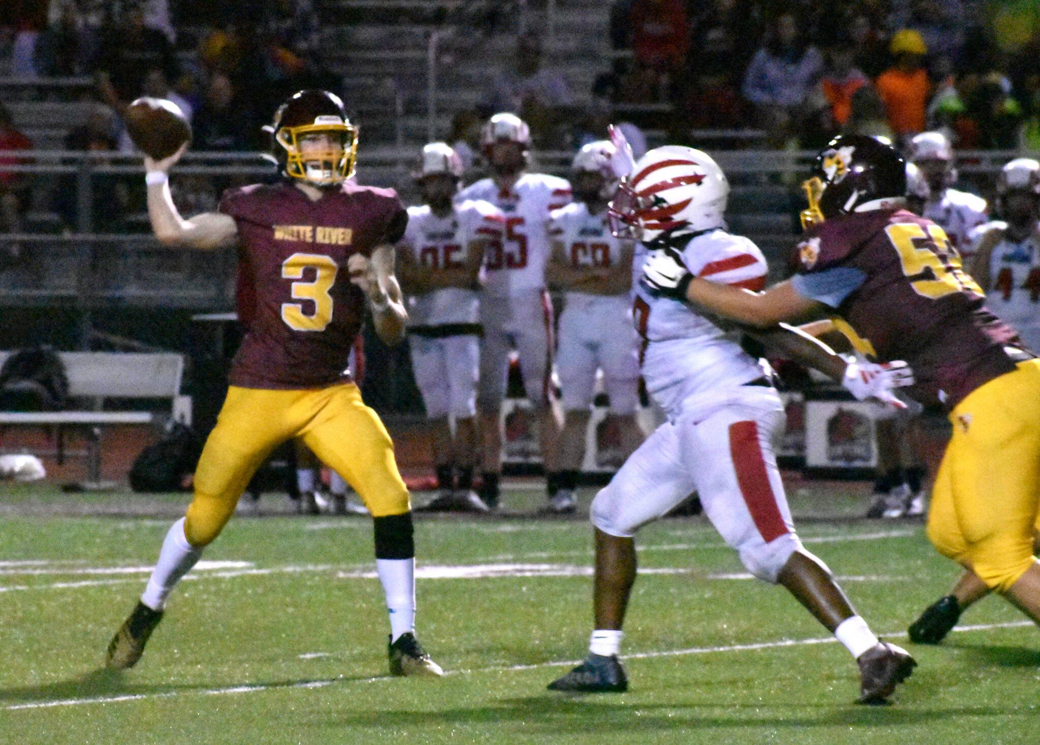 PHOTOS BY KEVIN HANSON
The Enumclaw High football team improved to 3-0 last week while the White River crew suffered its third straight defeat. Taking to the road Friday, Enumclaw thumped the Steilacoom Sentinels 42-0; in their three victories, EHS has outscored the opposition 90-19. Playing Thursday of last week, White River fell 42-14 to the visiting Orting Cardinals. This week, Enumclaw is on the road Friday night for a game against Orting; on Thursday, White River travels to Tacoma to face the 0-3 Foss Falcons. Pictured: During White Rivers Thursday home game, Hornet quarterback Aaden Rathbun looks for an open receiver.