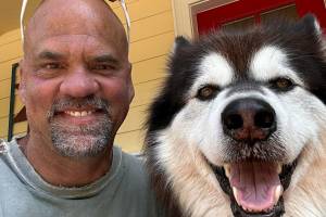 Photo courtesy Tanice Valison
Nick Valison and his husky, Nanuk, who was with him when he was killed.