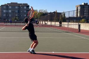 Gavin Orozco making a serve against a Stadium Tiger foe. Photo courtesy Andy Orozco