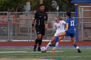 Panther striker Anne Anderson attempts to get back the Fife Trojans defense. Photo courtesy Andy Orozco