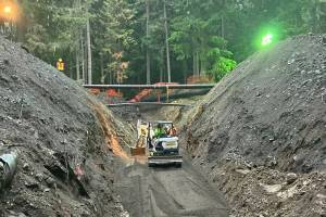SR 410 just past the Crystal Mountain Resort is fully closed to traffic as WSDOT workers create a culvert at for Dry Creek. Photo courtesy WSDOT