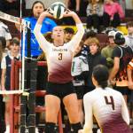 The Enumclaw High volleyball squad had little trouble defeating Clover Park Thursday night at Chuck Smith Gymnasium. With the win, the Hornets improved to 9-1 on the season; the squad sits in second place in the SPSL 2A and is ranked No. 10 in the states 2A ranks by the WIAA. Pictured here are Haley Dumontet (#3), setting up teammate Ailianna Quaempts (#4) for a kill. PHOTOS BY KEVIN HANSON