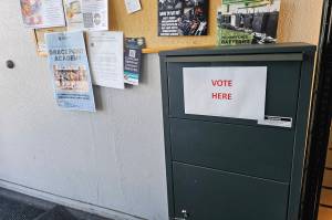 Photo by Ray Miller-Still
Its legal in Washington to be a third-part ballot collector, but election officials strongly suggest using official drop boxes instead.