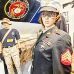 Some of the items featured is a WWI Purple Heart from Corporal John Abraham (above), the marine uniform of Buckley Senior Center Coordinator Chloe Mickelson, various models of planes and other memorabelia. Photo by Ray Miller-Still