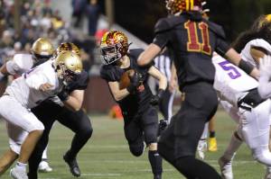 Photo by Todd Overdorf / SonScape Images
EHS Tristan Donovan, #12 gaining yards in the game against Highline last Friday.