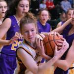 Enumclaw's Kalee Swanson wrestles for a loose ball during a successful match last season over the Columbia River Rapids. Photo by Kevin Hanson