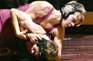 White River wrestlers, both boys and girls, coasted to victories on their home mat December 6. Helping the Hornet cause, pictured here, were Micah Eller and Jaslyn Storm.