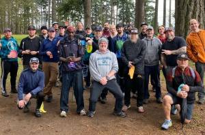 Submitted photo
Close to 40 disc golf players raised about $1,000 for Plateau Outreach Ministrys food banks in late December.
