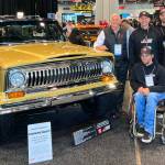 Contributed photo
The J-Rod & Custom team at the 2023 Specialty Equipment Marketing Association with their Battle of the Builders winning jeep. Pictured in the back row is car owner Richard Griot, Jared Hancock, Ross Petersen, and Andrew Taker; in from is Chad Terhar.