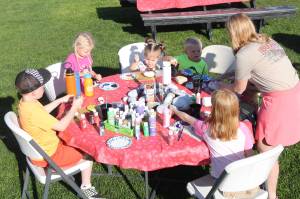Buckley residents of all ages came out last September to participate in the annual Beautify Buckley event; pictured here are kids painting rocks to bring some color to their city. Beautify Buckley is one of many organizations that received grant money from the White River Hometown Fund this year. Photo by Ray Miller-Still