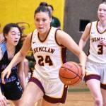 The Enumclaw High girls basketball team defeated Mark Morris Saturday afternoon, earning a berth in the states Round of 12 and a trip to the Yakima Valley SunDome. In this photo Emma Holt (24) pushes the ball across midcourt while looking for open teammates. Photo by Kevin Hanson