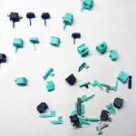 Photos courtesy the Department of Justice
Law enforcement allegedly confiscated Glock conversion devices that would turn the semi-automatic weapon into an automatic weapon, as well as several privately-made automatic firearms (or ghost guns) when they raided Ross Heinzinger and Ashley Lewis Black Diamond apartment.