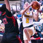 WRHS Hornet Sophie Ross-Soler drives to the hoop. Photo by Kevin Hanson