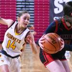 Photo by Kevin Hanson
WRHS Lexie Banks (14) looks to come up with a steal behind a Sammamish opponent.