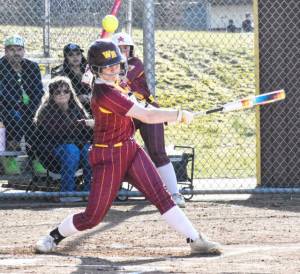 White River Hornets softball crushed Clover Park during their March 14 game 18-0 in the Hornets first game of the season. Pictured is Jaidyn March, fouling a pitch straight up. Photo by Kevin Hanson